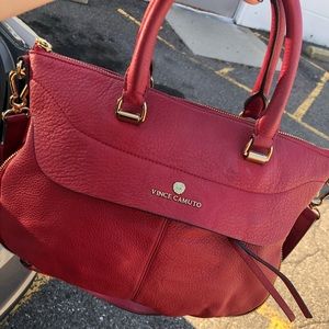 A hand bag that can also be worn as a cross body